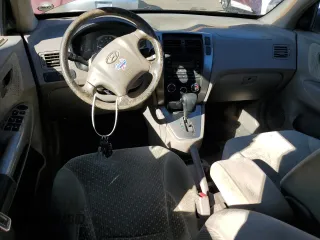 2005 Hyundai Tucson GLS with VIN KM8JN12D75U112964, listed as a Copart auction lot 75042354 with 77,827 mi miles and Salvage Title. Bid and sale history available at carsss.com. Image 8.