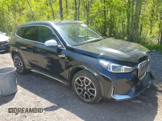 2023 BMW X1 xDrive28i with VIN WBX73EF04P5X86962, listed as a Copart auction lot 57575815 with 95,965 mi miles and Salvage title. Bid and sale history available at DreamBid. Image 4.