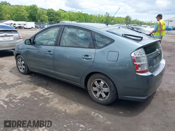 2005 Toyota Prius z VIN JTDKB20U853125464, wystawiony jako IAAI lot #42324259 z przebiegiem 166 742 mil mil oraz . Historia ofert i sprzedaży dostępna na DreamBid. Obrazek 3.