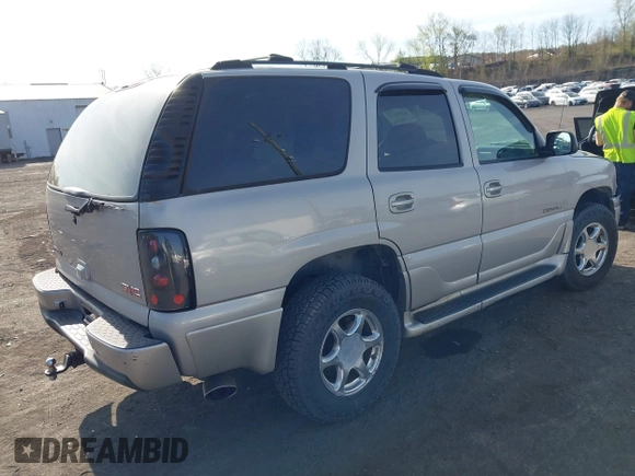 2004 GMC Yukon Denali z VIN 1GKEK63U84J181533, wystawiony jako IAAI lot #42098120 z przebiegiem 195 664 mil mil oraz . Historia ofert i sprzedaży dostępna na DreamBid. Obrazek 4.