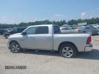2015 Ram 1500 Big Horn with VIN 1C6RR7LG3FS509244, listed as a IAAI auction lot 42384583 with 216,899 mi miles and . Bid and sale history available at DreamBid. Image 14.