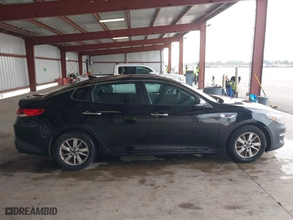 2016 Kia Optima LX with VIN 5XXGT4L34GG117088, listed as a IAAI auction lot 41681175 with 152,482 mi miles. Bid and sale history available at carsss.com. Image 13.