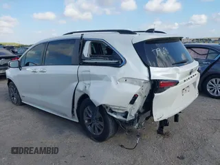 2021 Toyota Sienna XLE with VIN 5TDYRKEC7MS017968, listed as a IAAI auction lot 42145440 with 85,989 mi miles and . Bid and sale history available at DreamBid. Image 3.