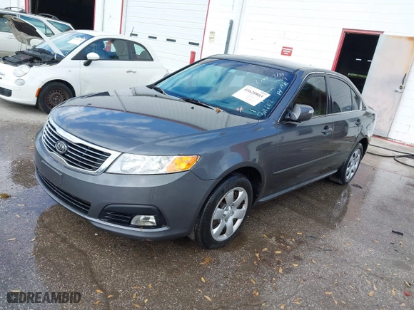 2009 Kia Optima LX with VIN KNAGE228495311622, listed as a IAAI auction lot 41628803 with 1 mi miles. Bid and sale history available at carsss.com. Image 2.