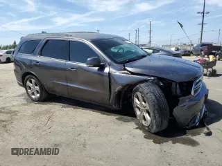 2015 Dodge Durango Limited z VIN 1C4RDJDG9FC240552, wystawiony jako Copart lot #58221145 z przebiegiem 121 882 mil mil oraz Szkoda całkowita • Salvage title. Historia ofert i sprzedaży dostępna na DreamBid. Obrazek 4.