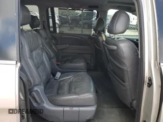2005 Honda Odyssey EX-L z VIN 5FNRL38655B408107, wystawiony jako Copart lot #50918155 z przebiegiem 215 920 mil mil oraz Szkoda całkowita • Salvage title. Historia ofert i sprzedaży dostępna na DreamBid. Obrazek 11.