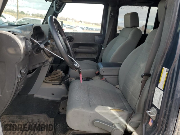 2007 Jeep Wrangler Unlimited Rubicon with VIN 1J4GA69177L100903, listed as a Copart auction lot 81321154 with 130,632 mi miles and Salvage title. Bid and sale history available at DreamBid. Image 7.