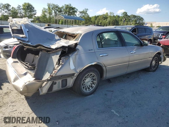 1999 Lincoln Town Car Signature z VIN 1LNHM82W7XY626305, wystawiony jako Copart lot #58009475 z przebiegiem Nie podano mil oraz Szkoda całkowita • Salvage title. Historia ofert i sprzedaży dostępna na DreamBid. Obrazek 3.