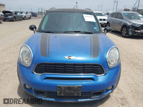 2014 MINI Countryman S with VIN WMWZC3C52EWP28069, listed as a IAAI auction lot 42026583 with 137,342 mi miles and . Bid and sale history available at DreamBid. Image 6.