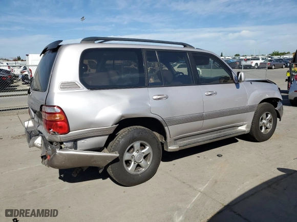 2002 Toyota Land Cruiser with VIN JTEHT05J922020391, listed as a Copart auction lot 52810615 with 309,358 mi miles and Salvage Title. Bid and sale history available at carsss.com. Image 3.