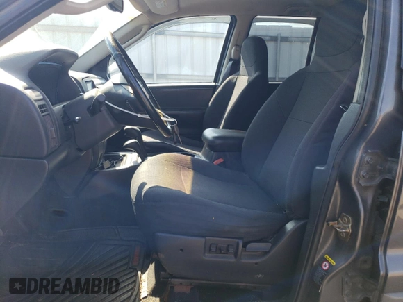 2002 Jeep Grand Cherokee Laredo с VIN 1J8GW48S22C206165, выставлен на аукционе Copart как лот 62193315 с пробегом 186 544 миль миль и Чистый • Clean title. История ставок и продаж доступна на DreamBid. Изображение 7.