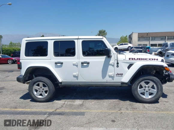 2018 Jeep Wrangler Unlimited Rubicon with VIN 1C4HJXFN8JW215023, listed as a IAAI auction lot 42227099 with 62,195 mi miles and . Bid and sale history available at DreamBid. Image 13.