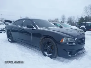 2014 Dodge Charger RT Plus with VIN 2C3CDXCT2EH134970, listed as a IAAI auction lot 41238430 with 148,066 mi miles. Bid and sale history available at carsss.com. Image 1.