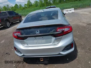 2018 Honda Clarity z VIN JHMZC5F14JC007026, wystawiony jako IAAI lot #42361556 z przebiegiem 74 132 mil mil oraz . Historia ofert i sprzedaży dostępna na DreamBid. Obrazek 16.