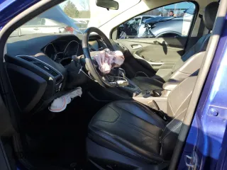 2014 Ford Focus Titanium with VIN 1FADP3J27EL410059, listed as a Copart auction lot 41634085 with 156,053 mi miles and Salvage Title. Bid and sale history available at carsss.com. Image 7.
