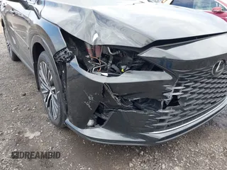 2023 Lexus RX 350 with VIN 2T2BAMCA1PC015877, listed as a IAAI auction lot 42030702 with 17,147 mi miles and . Bid and sale history available at DreamBid. Image 6.