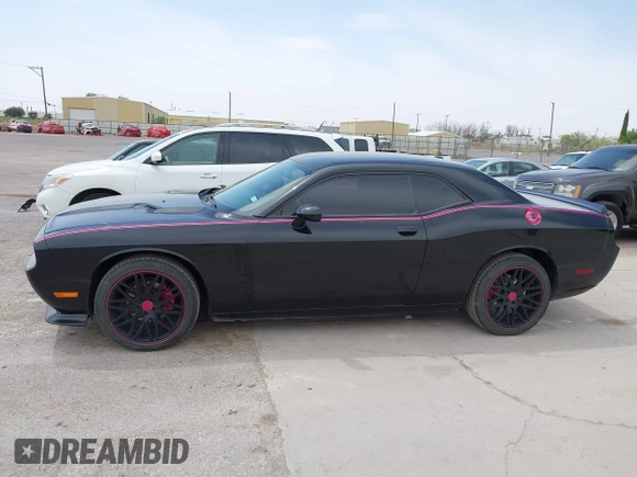 2012 Dodge Challenger SXT Plus with VIN 2C3CDYAG5CH268607, listed as a IAAI auction lot 41982122 with 188,091 mi miles. Bid and sale history available at carsss.com. Image 13.