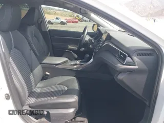 2023 Toyota Camry SE with VIN 4T1G11AK1PU776945, listed as a IAAI auction lot 41744551 with 66,086 mi miles and . Bid and sale history available at carsss.com. Image 5.