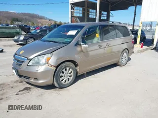 2006 Honda Odyssey EX z VIN 5FNRL384X6B459148, wystawiony jako IAAI lot #41747616 z przebiegiem 158 995 mil mil oraz . Historia ofert i sprzedaży dostępna na DreamBid. Obrazek 2.