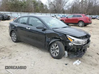 2022 Kia Rio S with VIN 3KPA24AD9NE505086, listed as a Copart auction lot 47869415 with 24,215 mi miles and Salvage Title. Bid and sale history available at carsss.com. Image 4.