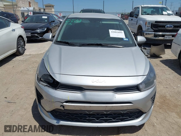 2023 Kia Rio S z VIN 3KPA24AD6PE600384, wystawiony jako IAAI lot #42003099 z przebiegiem 27 001 mil mil oraz . Historia ofert i sprzedaży dostępna na DreamBid. Obrazek 12.