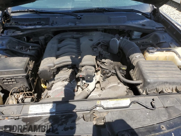 2008 Dodge Charger z VIN 2B3LA43GX8H294087, wystawiony jako Copart lot #54843755 z przebiegiem 208 359 mil mil oraz Szkoda całkowita • Salvage title. Historia ofert i sprzedaży dostępna na DreamBid. Obrazek 11.