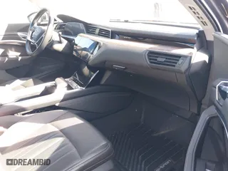 2019 Audi e-tron Premium Plus with VIN WA1LAAGE4KB012574, listed as a IAAI auction lot 41916641 with 104,911 mi miles. Bid and sale history available at carsss.com. Image 5.