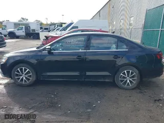 2018 Volkswagen Jetta 1.4T SE with VIN 3VWDB7AJ8JM240887, listed as a IAAI auction lot 40657661 with 76,568 mi miles. Bid and sale history available at carsss.com. Image 14.