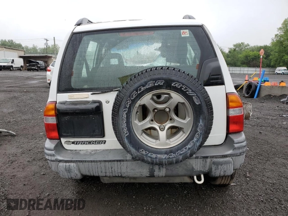 2002 Chevrolet Tracker ZR2 с VIN 2CNBJ734726925605, выставлен на аукционе Copart как лот 60070915 с пробегом Не указан миль и Списание • Salvage title. История ставок и продаж доступна на DreamBid. Изображение 6.