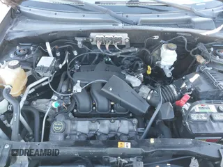 2006 Mercury Mariner Luxury with VIN 4M2YU56156KJ11686, listed as a IAAI auction lot 41854750 with 145,048 mi miles and . Bid and sale history available at DreamBid. Image 10.