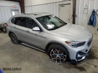 2020 BMW X1 xDrive28i with VIN WBXJG9C06L5P94397, listed as a Copart auction lot 46182585 with 74,244 mi miles and Salvage Title. Bid and sale history available at carsss.com. Image 4.