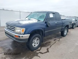 1997 Toyota T100 SR5 with VIN JT4UN24D7V0048050, listed as a IAAI auction lot 41556487 with 325,187 mi miles and . Bid and sale history available at DreamBid. Image 2.