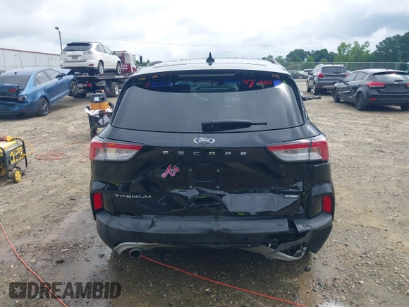 2021 Ford Escape Titanium Hybrid z VIN 1FMCU0DZ0MUA16798, wystawiony jako IAAI lot #42502086 z przebiegiem 107 250 mil mil oraz . Historia ofert i sprzedaży dostępna na DreamBid. Obrazek 16.
