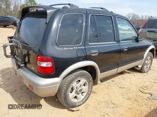 2000 Kia Sportage with VIN KNDJB7236Y5685392, listed as a IAAI auction lot 41785012 with 183,445 mi miles. Bid and sale history available at carsss.com. Image 4.