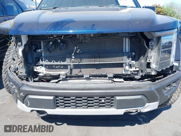 2023 Ford F-150 Raptor with VIN 1FTFW1RG1PFA87381, listed as a IAAI auction lot 41710758 with 19,626 mi miles and . Bid and sale history available at DreamBid. Image 6.