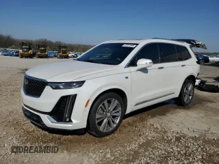 2020 Cadillac XT6 FWD Premium Luxury with VIN 1GYKPCRS5LZ101815, listed as a Copart auction lot 47931695 with 50,789 mi miles and Salvage Title. Bid and sale history available at carsss.com. Image 1.