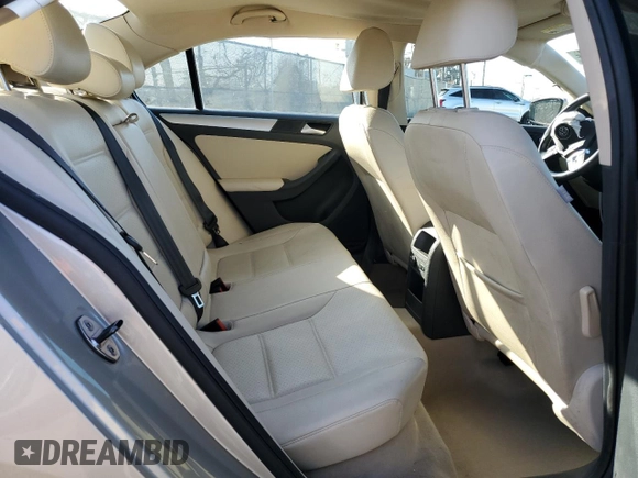 2014 Volkswagen Jetta SE with VIN 3VWD17AJ2EM240795, listed as a Copart auction lot 49749455 with 73,389 mi miles and Salvage title. Bid and sale history available at DreamBid. Image 11.