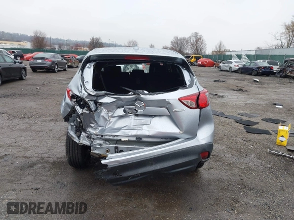 2016 Mazda CX-5 Grand Touring with VIN JM3KE4DY4G0712465, listed as a IAAI auction lot 41859217 with 61,806 mi miles and . Bid and sale history available at carsss.com. Image 17.