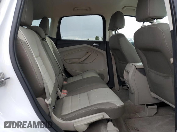 2013 Ford Escape SE z VIN 1FMCU9GX9DUC38478, wystawiony jako Copart lot #51266685 z przebiegiem 102 713 mil mil oraz Szkoda całkowita • Salvage title. Historia ofert i sprzedaży dostępna na DreamBid. Obrazek 11.
