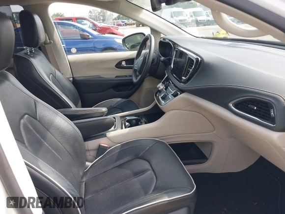 2023 Chrysler Pacifica Limited with VIN 2C4RC1GG7PR566163, listed as a IAAI auction lot 42393988 with 59,354 mi miles and . Bid and sale history available at DreamBid. Image 5.