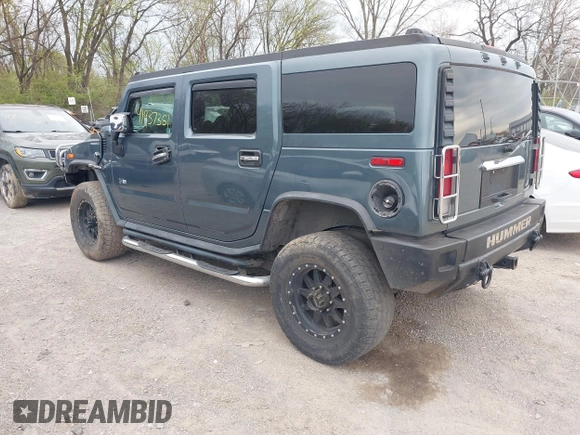 2005 Hummer H2 SUV z VIN 5GRGN23U95H100888, wystawiony jako IAAI lot #41937351 z przebiegiem 202 969 mil mil oraz . Historia ofert i sprzedaży dostępna na DreamBid. Obrazek 3.
