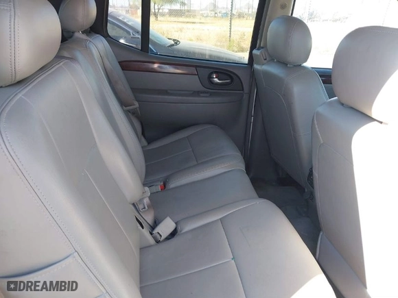 2005 GMC Envoy XUV SLE with VIN 1GKET12S356185669, listed as a IAAI auction lot 40794181 with 221,819 mi miles. Bid and sale history available at carsss.com. Image 8.