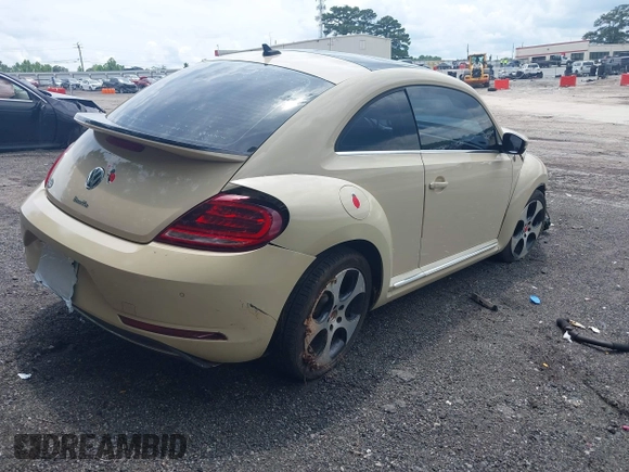 2019 Volkswagen Beetle S with VIN 3VWFD7AT2KM700941, listed as a IAAI auction lot 42474867 with 43,891 mi miles and . Bid and sale history available at DreamBid. Image 4.