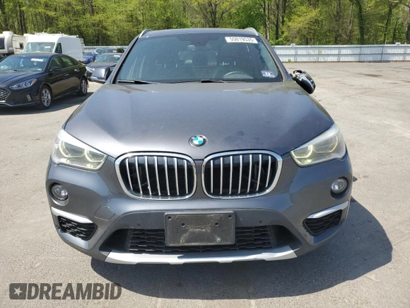 2017 BMW X1 xDrive28i z VIN WBXHT3Z37H4A54544, wystawiony jako Copart lot #55019535 z przebiegiem 76 822 mil mil oraz Szkoda całkowita • Salvage title. Historia ofert i sprzedaży dostępna na DreamBid. Obrazek 5.
