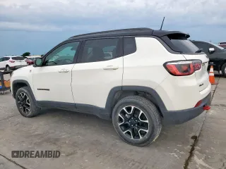 2020 Jeep Compass Trailhawk with VIN 3C4NJDDB3LT189398, listed as a Copart auction lot 59376995 with 75,674 mi miles and Salvage title. Bid and sale history available at DreamBid. Image 2.