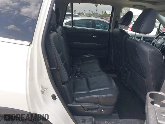 2017 Honda Pilot Touring with VIN 5FNYF5H95HB042632, listed as a IAAI auction lot 42011885 with 103,321 mi miles. Bid and sale history available at carsss.com. Image 8.