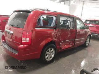 2010 Chrysler Town & Country Touring with VIN 2A4RR5D14AR212995, listed as a IAAI auction lot 41944861 with 264,784 mi miles. Bid and sale history available at carsss.com. Image 4.