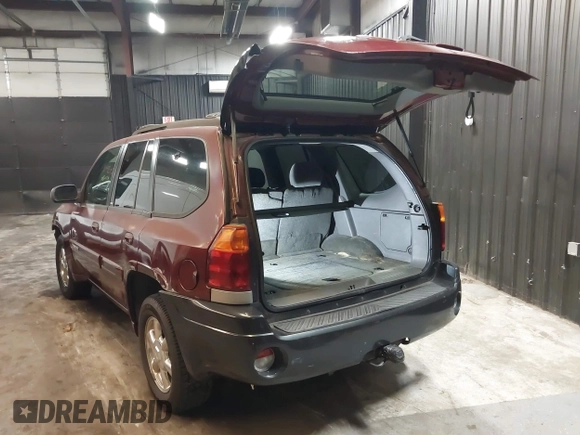 2002 GMC Envoy SLT with VIN 1GKDT13SX22426320, listed as a IAAI auction lot 41709359 with 104,418 mi miles. Bid and sale history available at carsss.com. Image 3.