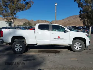 2020 Chevrolet Colorado 4WD Work Truck with VIN 1GCGTBEN9L1145963, listed as a IAAI auction lot 41196954 with 134,526 mi miles and . Bid and sale history available at DreamBid. Image 14.