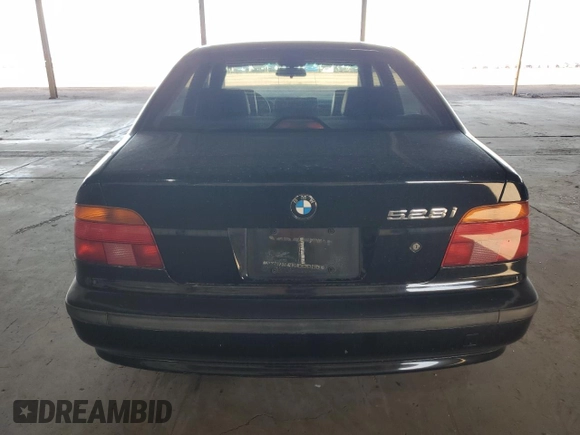 1999 BMW 5 Series 528iA with VIN WBADM6344XBY34517, listed as a Copart auction lot 51803145 with 186,637 mi miles and Salvage Title. Bid and sale history available at carsss.com. Image 6.